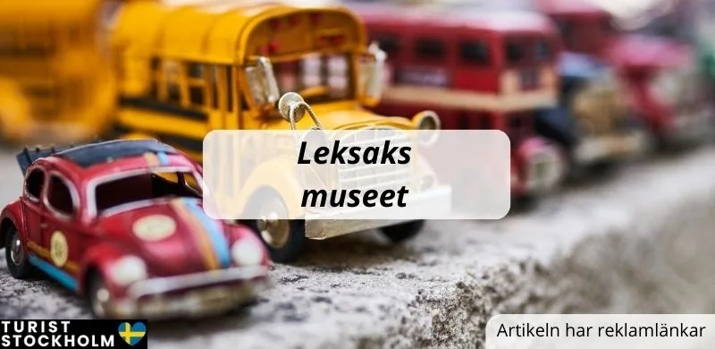 Gamla leksaker och texten Leksaksmuseet